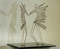 0062  Nephthys und Isis I  2000<br />Edelstahl auf Holzkonsole,  60 x 60 x 40 cm